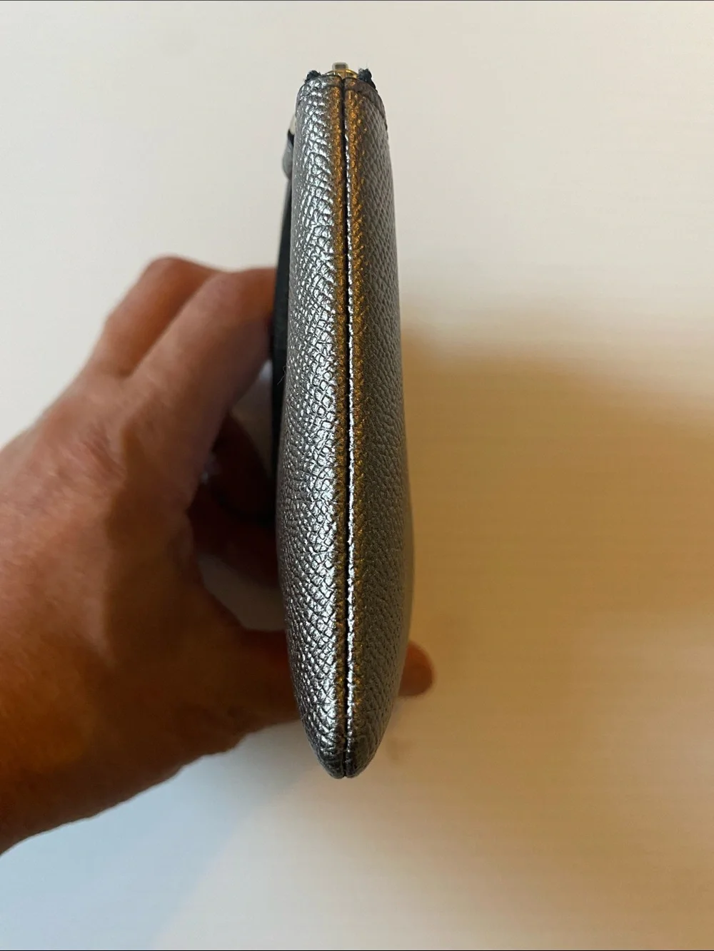 Coach Corner Zip Leather Wristlet in Silver and Black. F21070